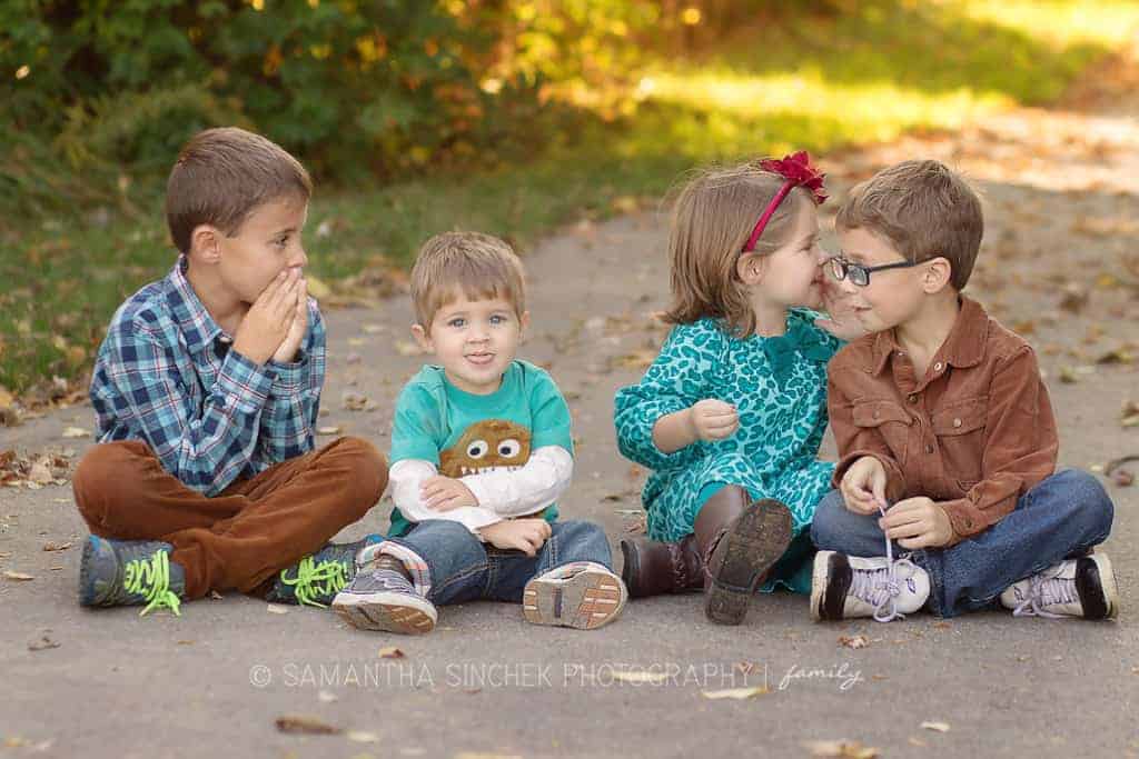 4 siblings whisper to each other