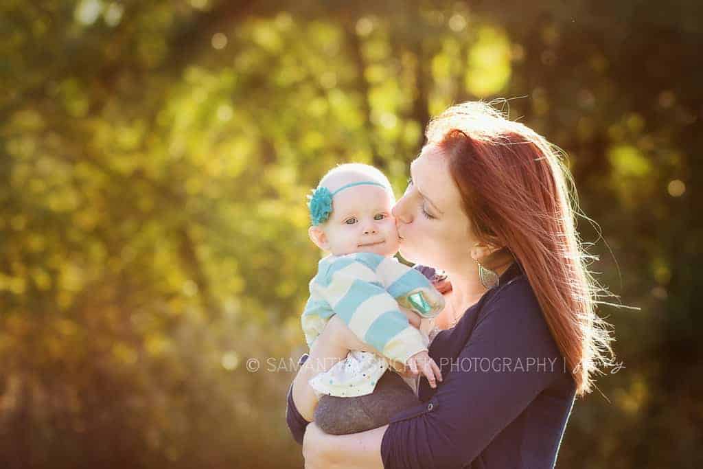 ,other kisses toddler girl on head at family session with samantha sinchek 