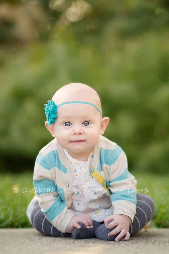 baby girl sis up on path at ault park