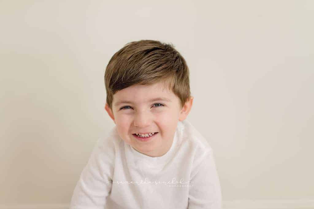older brother during newborn photos