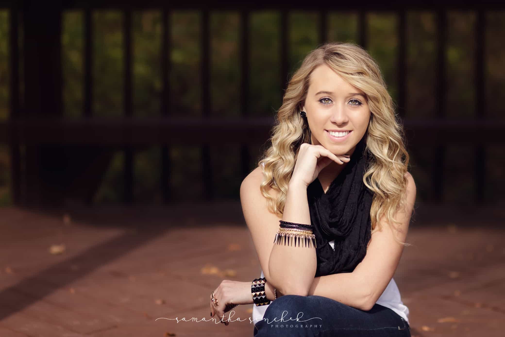 high school senior wearing scarf at photo session in blue ash ohio