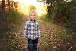 boy poses at cincinnati photographer mini session with samantha sinchek at french park