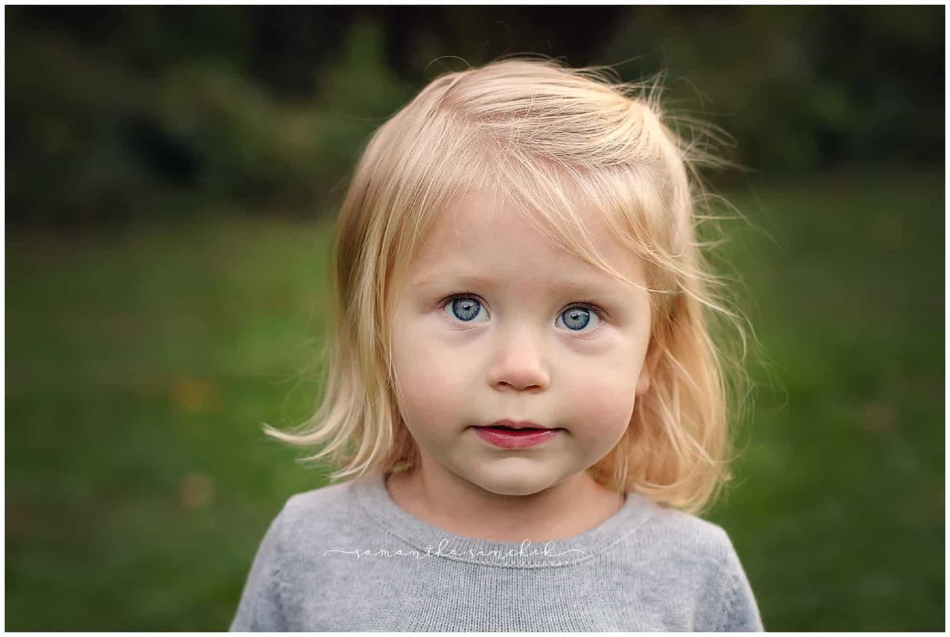 blue eyed child during photo session with samantha sinchek photography
