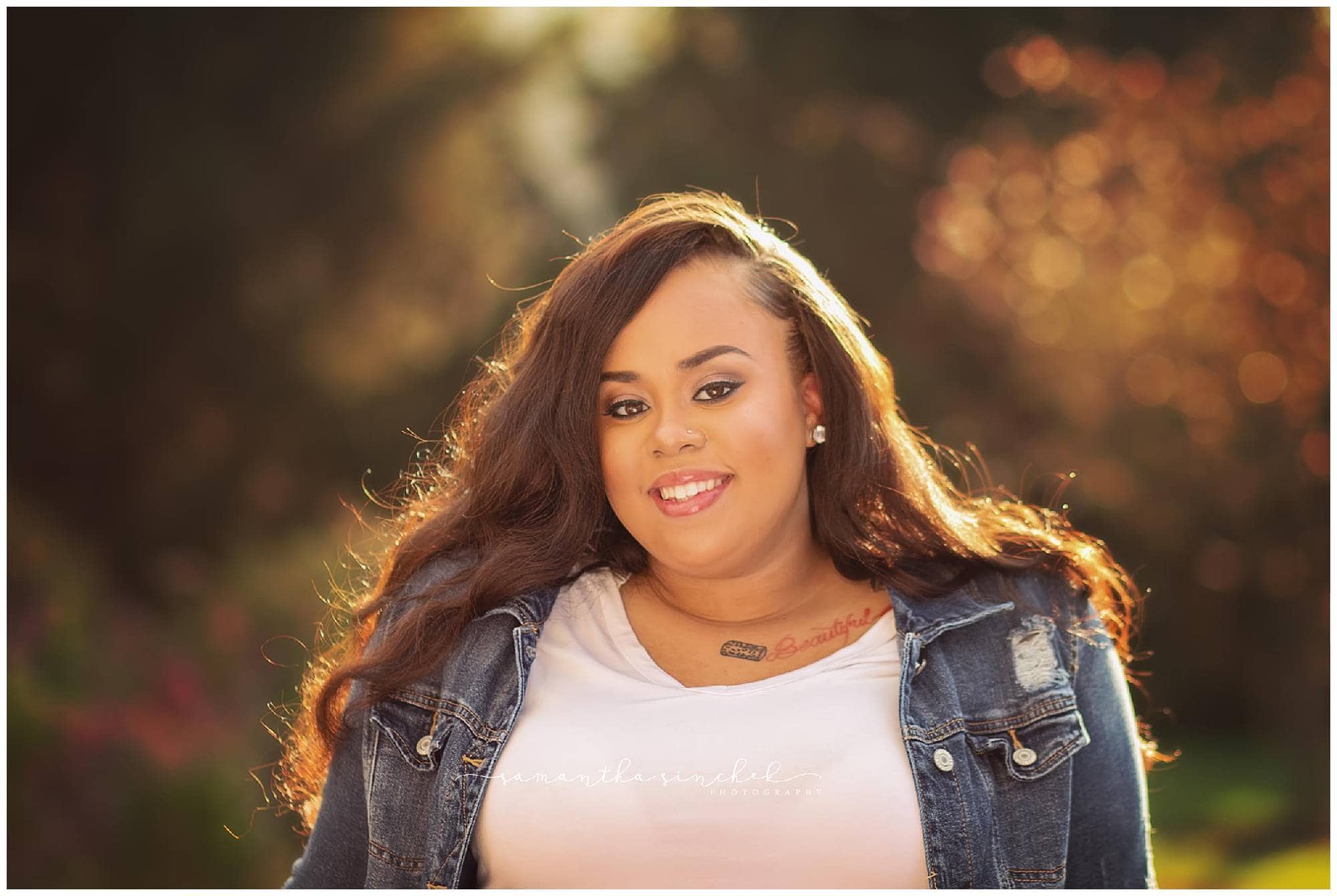 cincinnati high school senior poses during photo session with sinchek