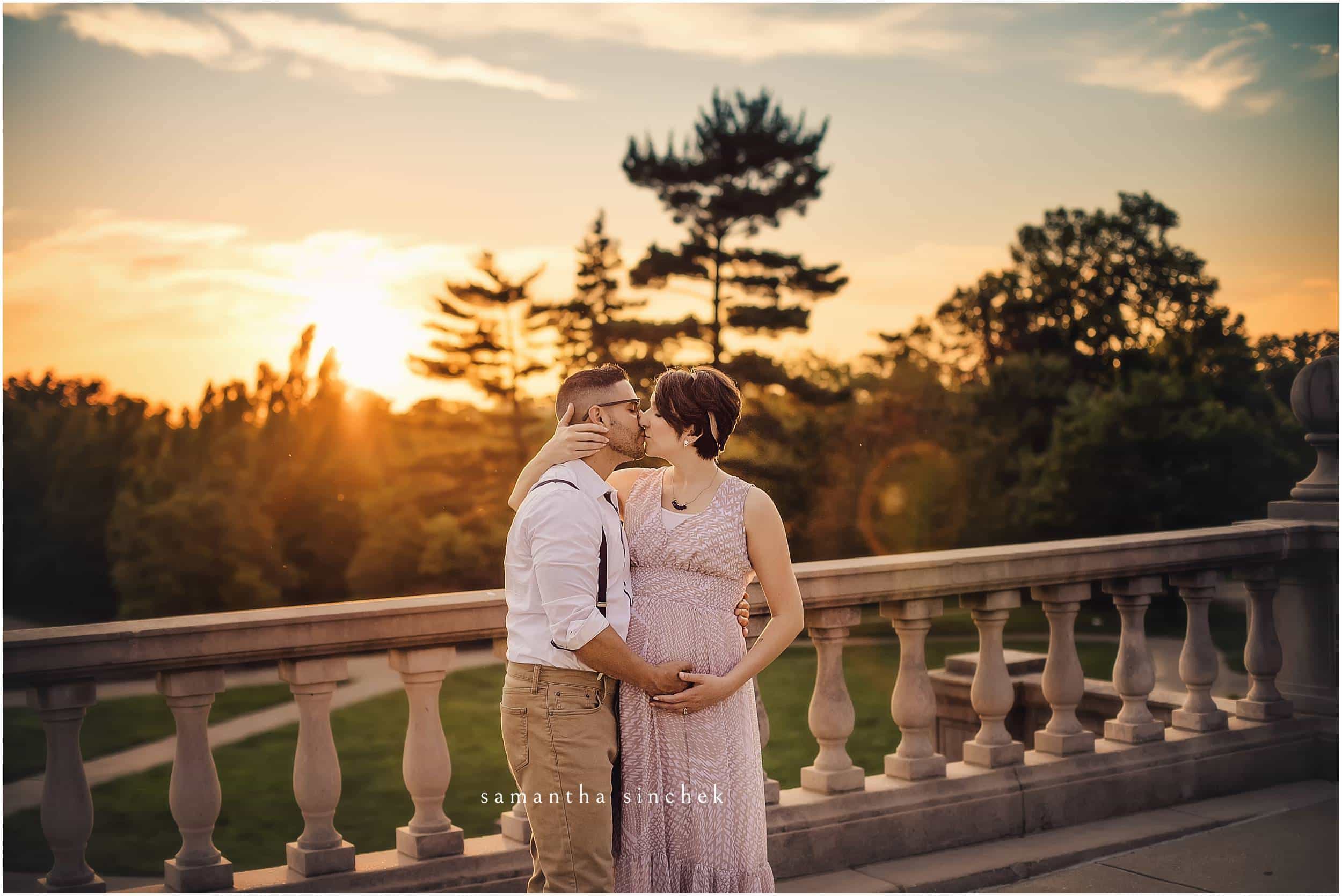 couple kisses on ault park balcony in cincinnati with samantha sinchek photography
