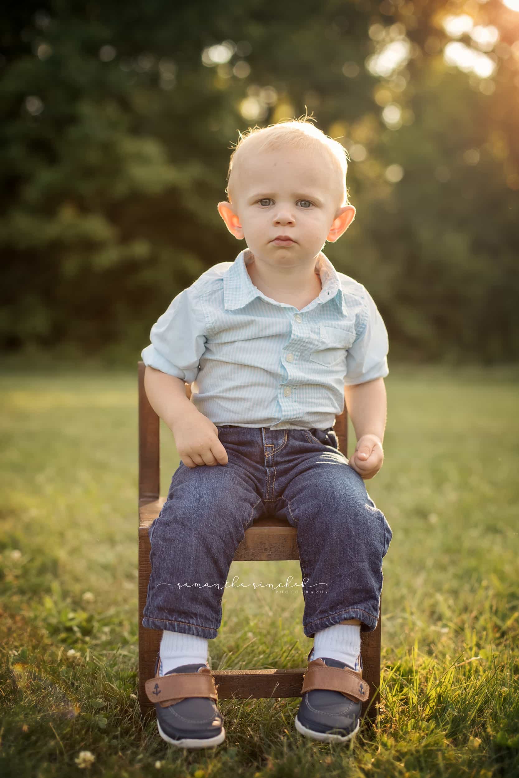 young boy sits at cincinnati family photography session with samantha sinchek 