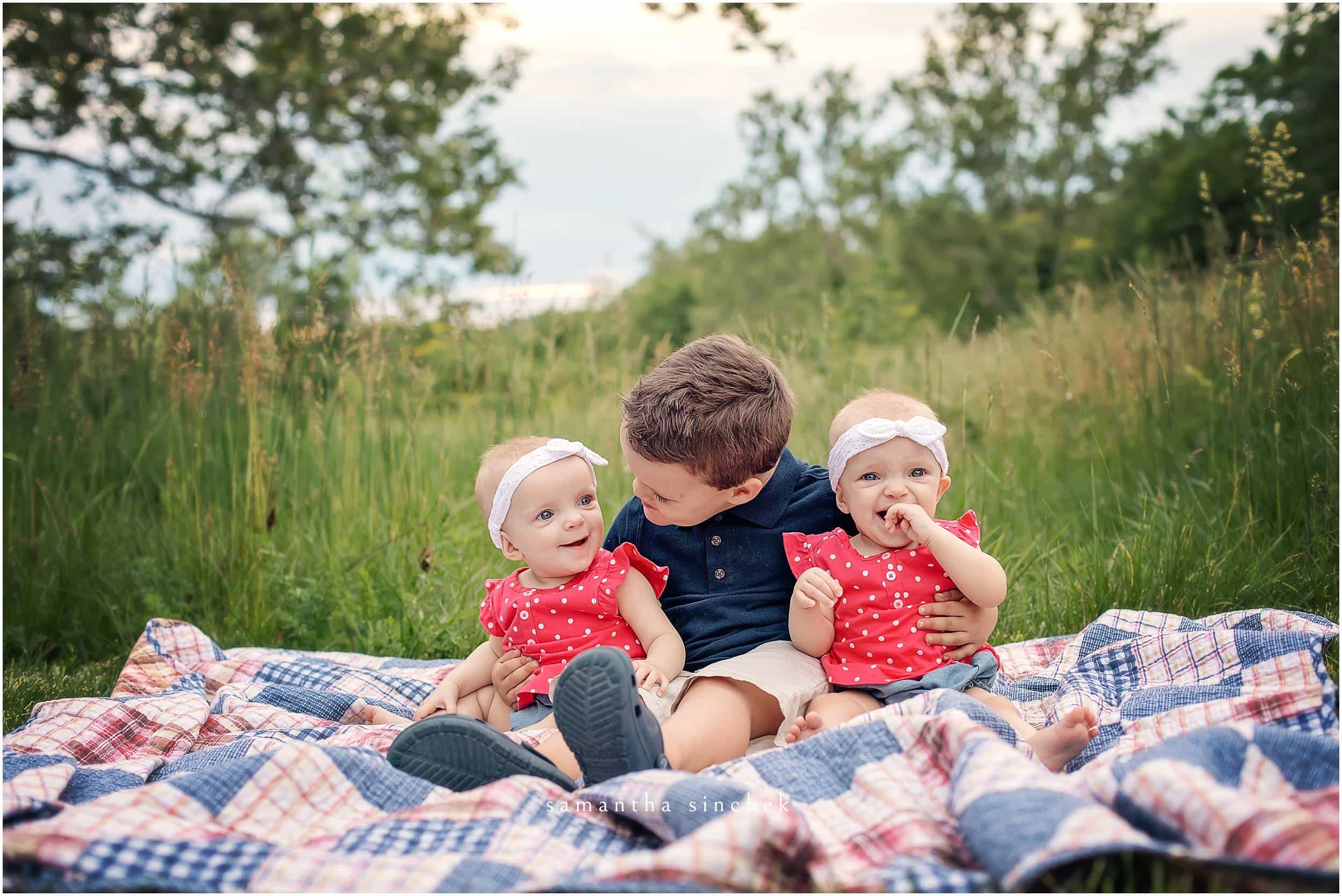twin girls sit with big brother at glenwood gardens with samantha sinchek photography 