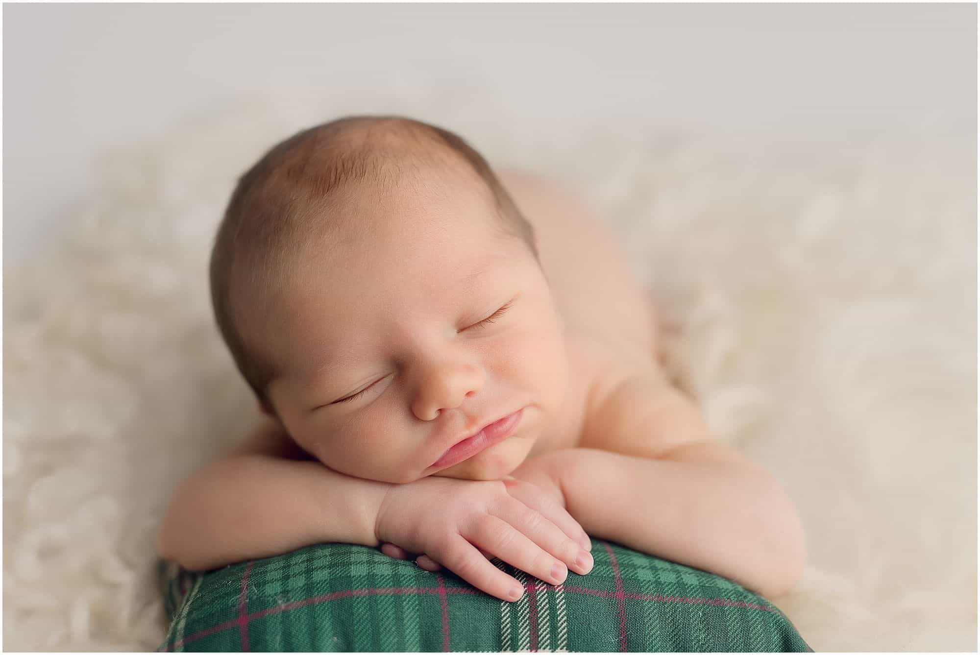 smiling newborn at pictures with cincinnati photographer Samantha sinchek 