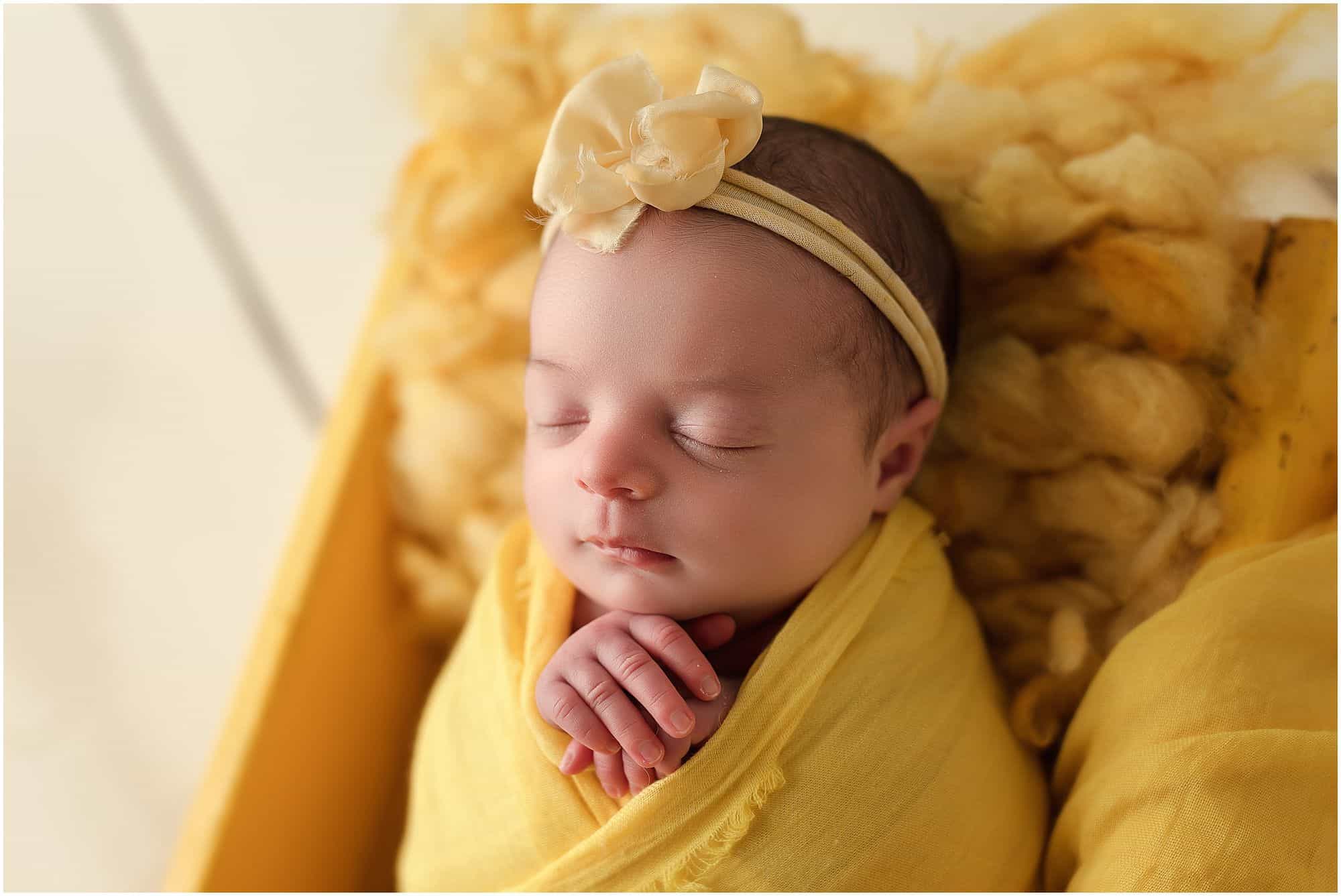 little ray of sunshine at newborn pictures at cincinnati ohio Samantha sinchek photography