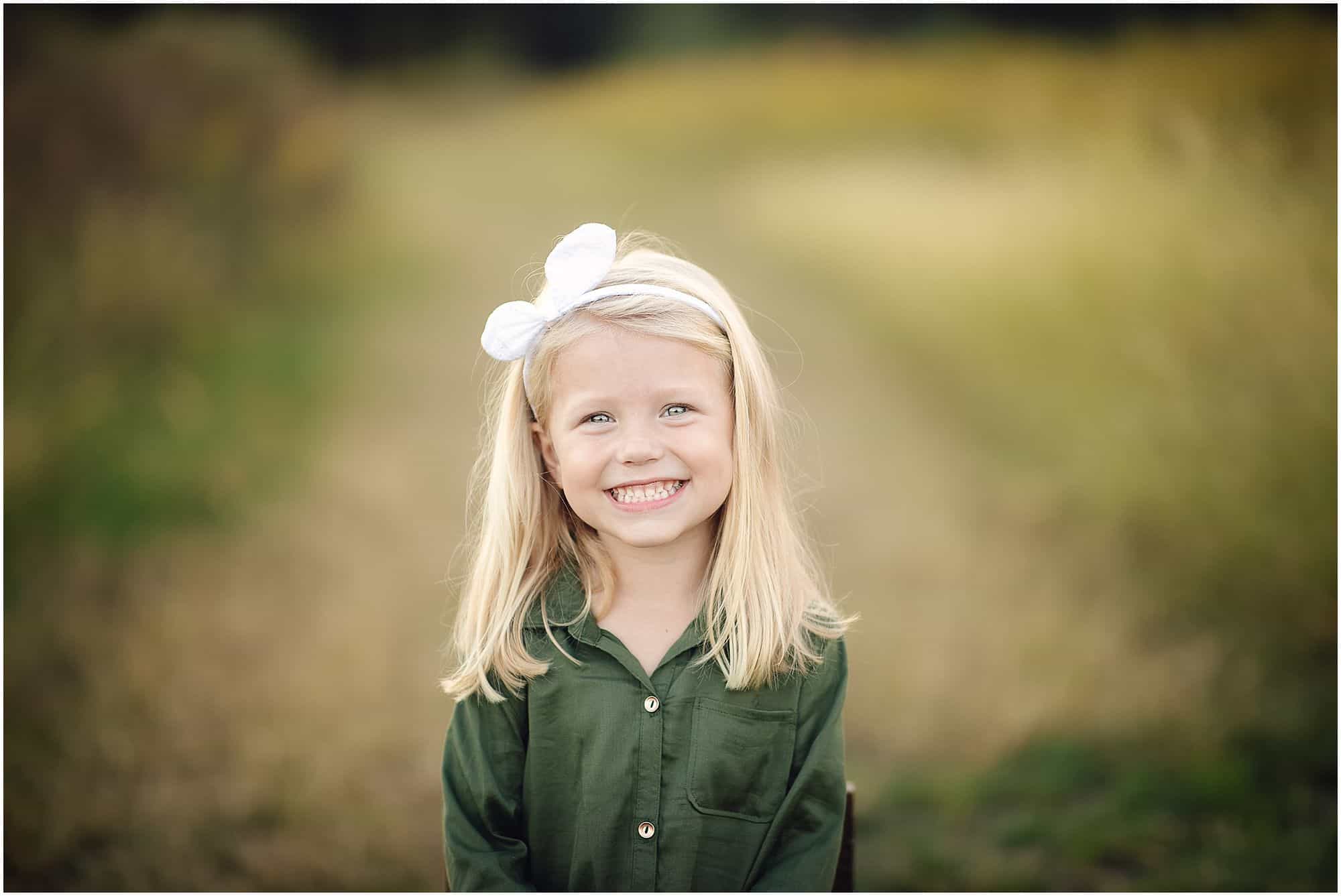 outdoor family photographer in Cincinnati Ohio at Summit Park in Blue Ash with Tomlin family during a fall day