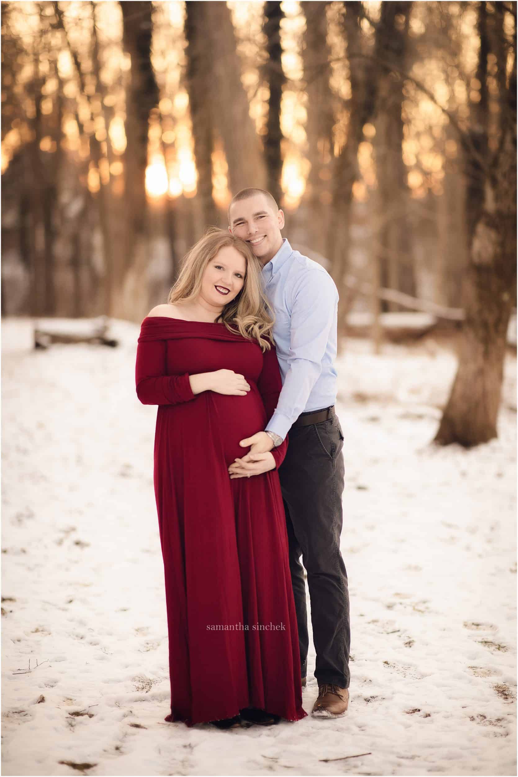 maternity session at Ault Park Cincinnati red dress in the snow Samantha Sinchek