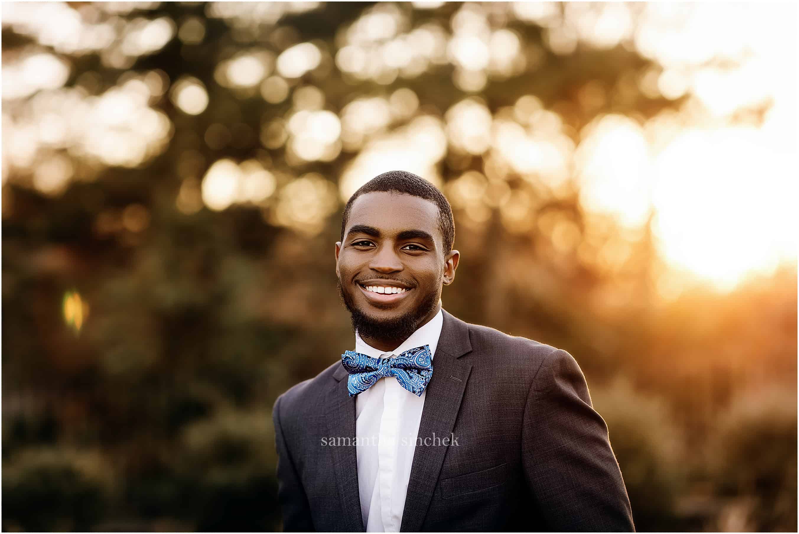 cincinnati senior smiles at his photo session with Cincinnati's best senior photographer Samantha Sinchek