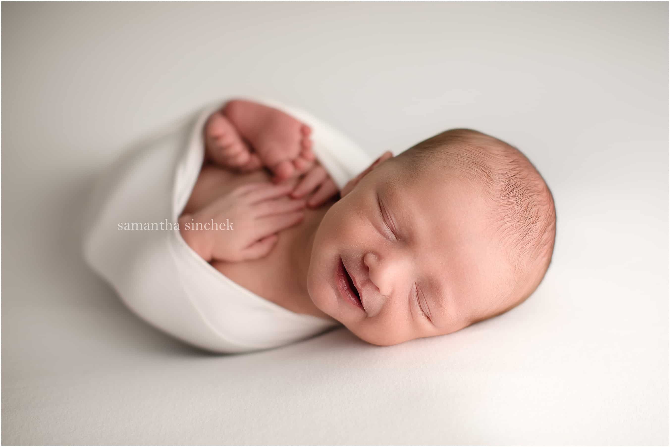 newborn boy sleeping at pictures with Cincinnati's best newborn photographer Samantha Sinchek photography