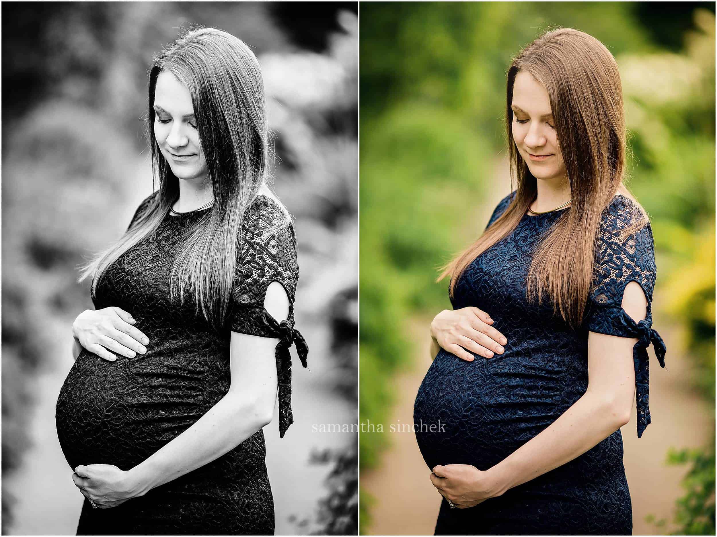 mother holding belly at Ault Park Cincinnati Ohio wearing blue dress