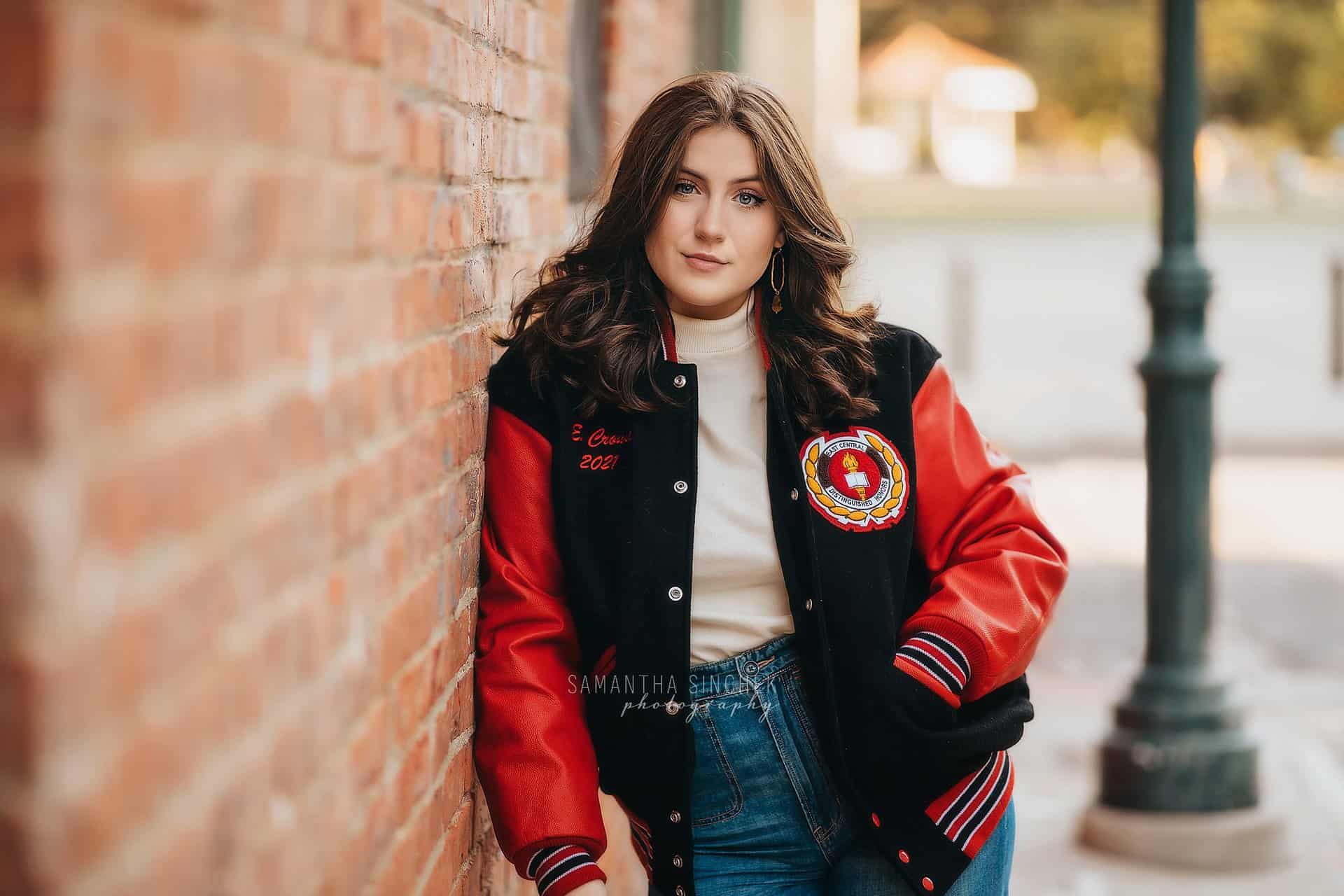 east central high school senior poses in downtown cincinnati with Samantha Sinchek Photography
