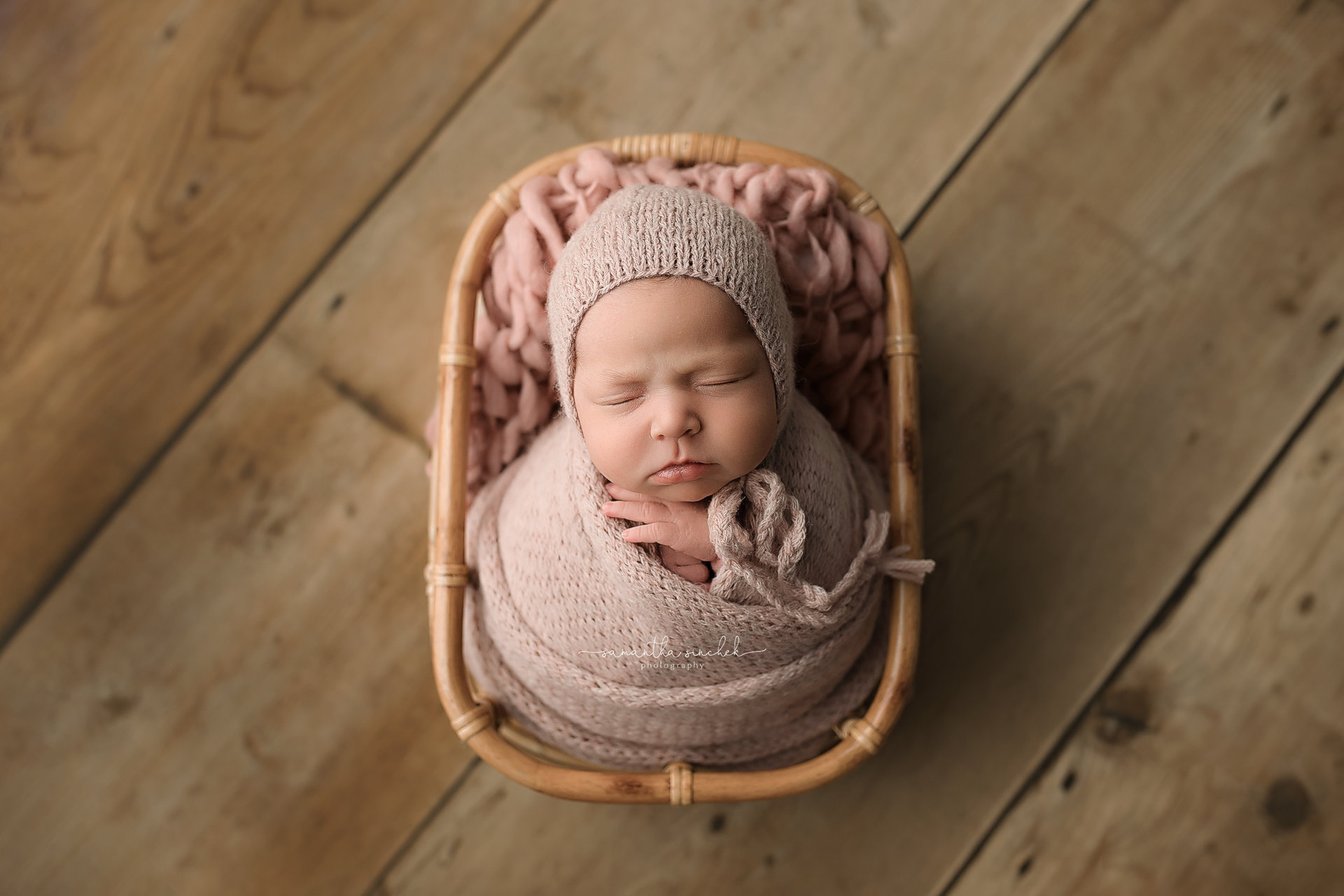 16 day old newborn baby asleep in basket at pictures with Samantha Sinchek Photography